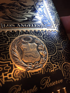 detail of Peru coat of arms on Ucayali Private Reserve 70% Dark Chocolate packaging